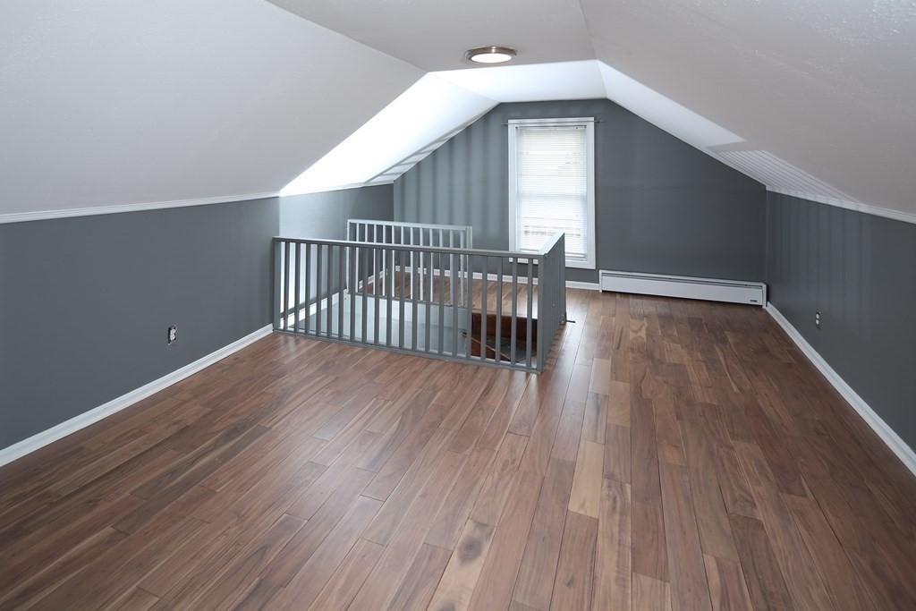 137 Mendon Road Attleboro, MA 02703 - Photo 14 of 24 a view of a hallway with wooden floor
