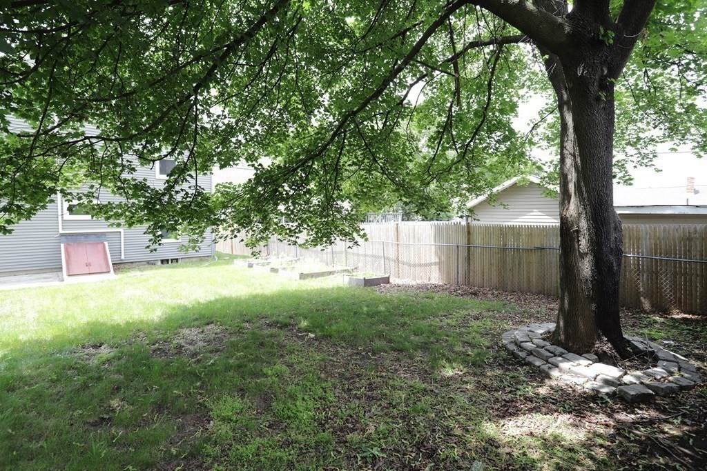 137 Mendon Road Attleboro, MA 02703 - Photo 20 of 24 a view of backyard and tree