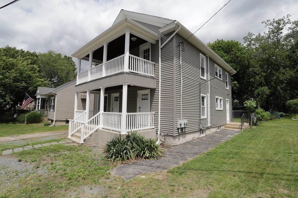 137 Mendon Road Attleboro, MA 02703 - Photo 23 of 24 a front view of a house with a yard