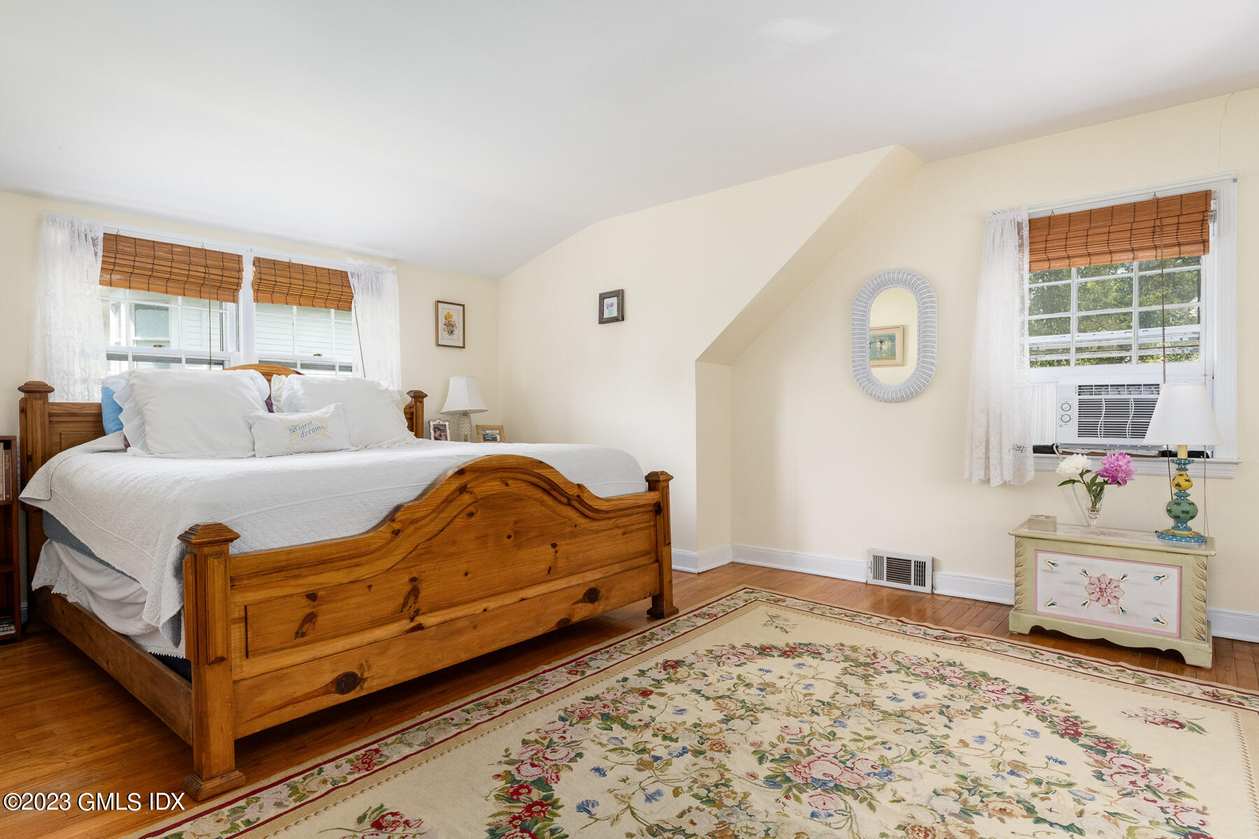 7 Wilmot Lane Riverside, CT 06878 - Photo 14 of 22 a bedroom with a bed and a window