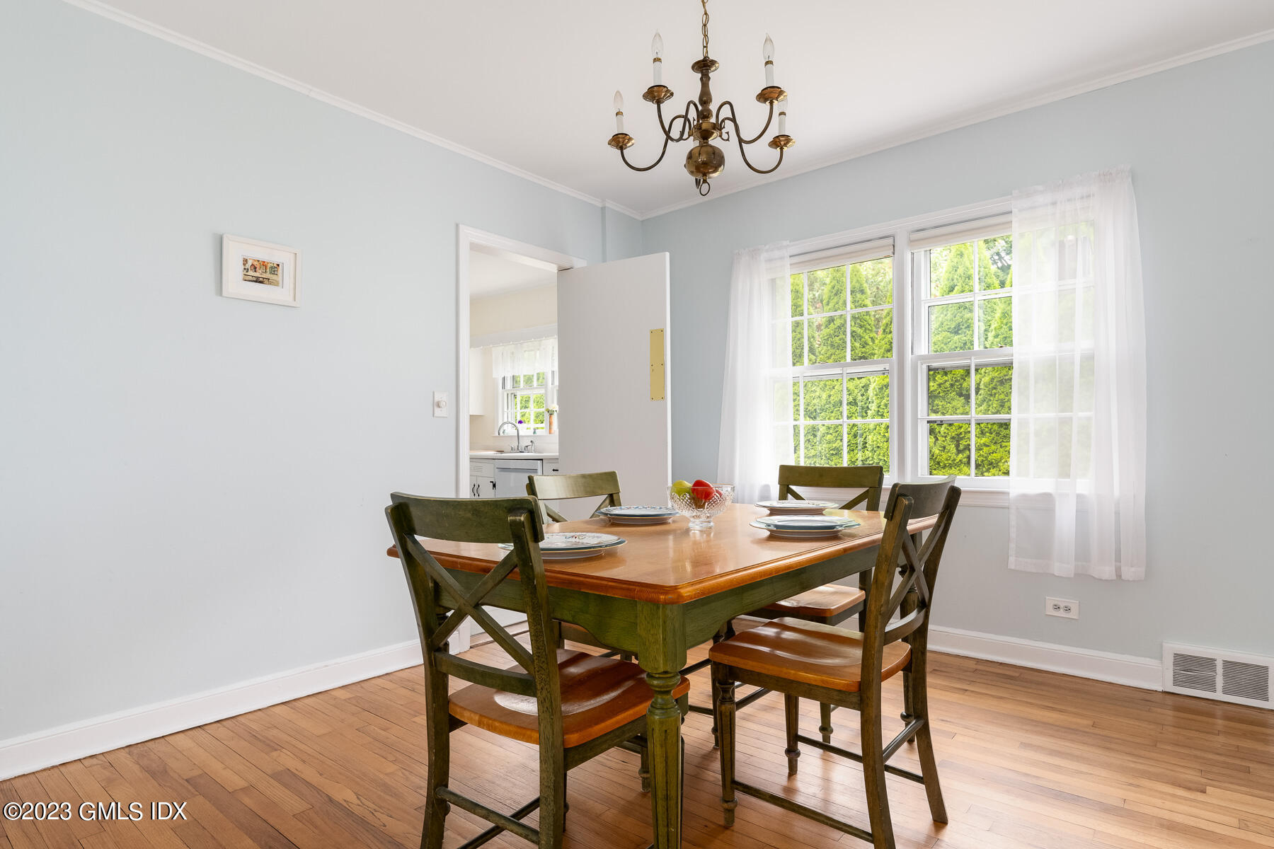 7 Wilmot Lane Riverside, CT 06878 - Photo 8 of 22 a view of a dining room with furniture window and wooden floor