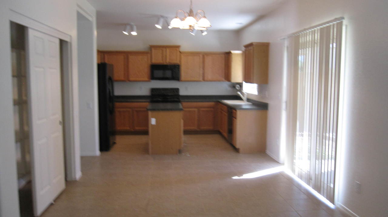 5347 West Maldonado Road Laveen, AZ 85339 - Photo 14 of 24 View of Kitchen from Family Room 2