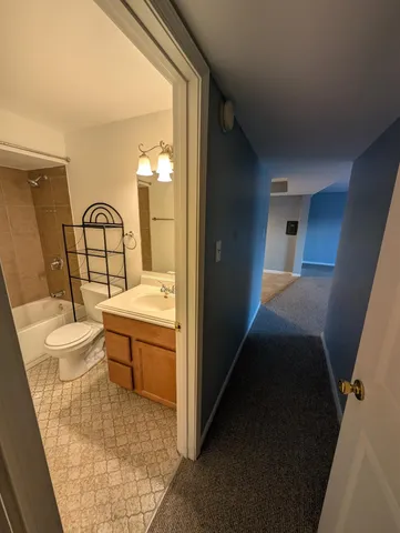 a view of hallway with stairs