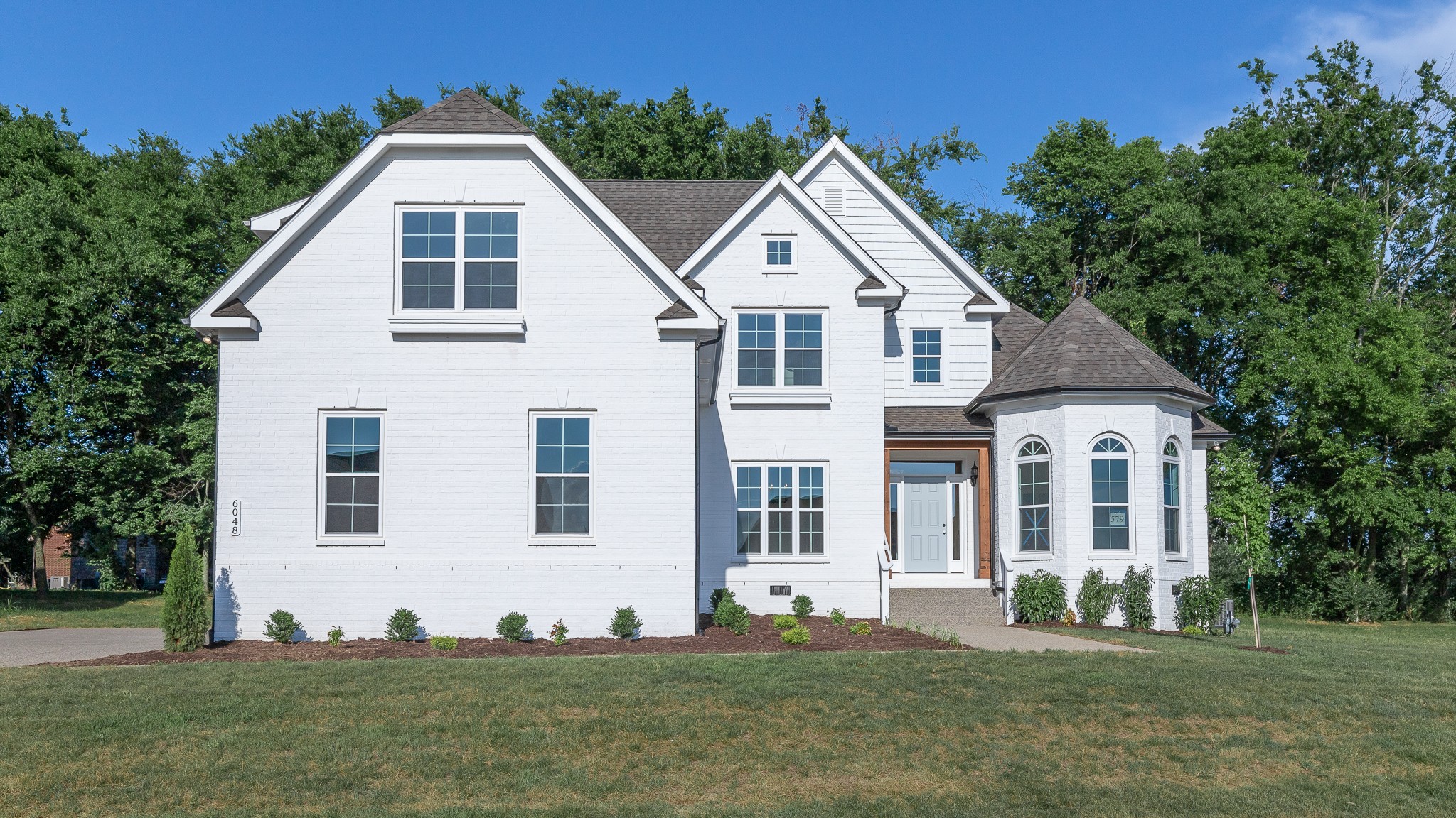 6048 Kidman Lane Spring Hill, TN 37174 - Photo 2 of 31 a view of a white house with yard