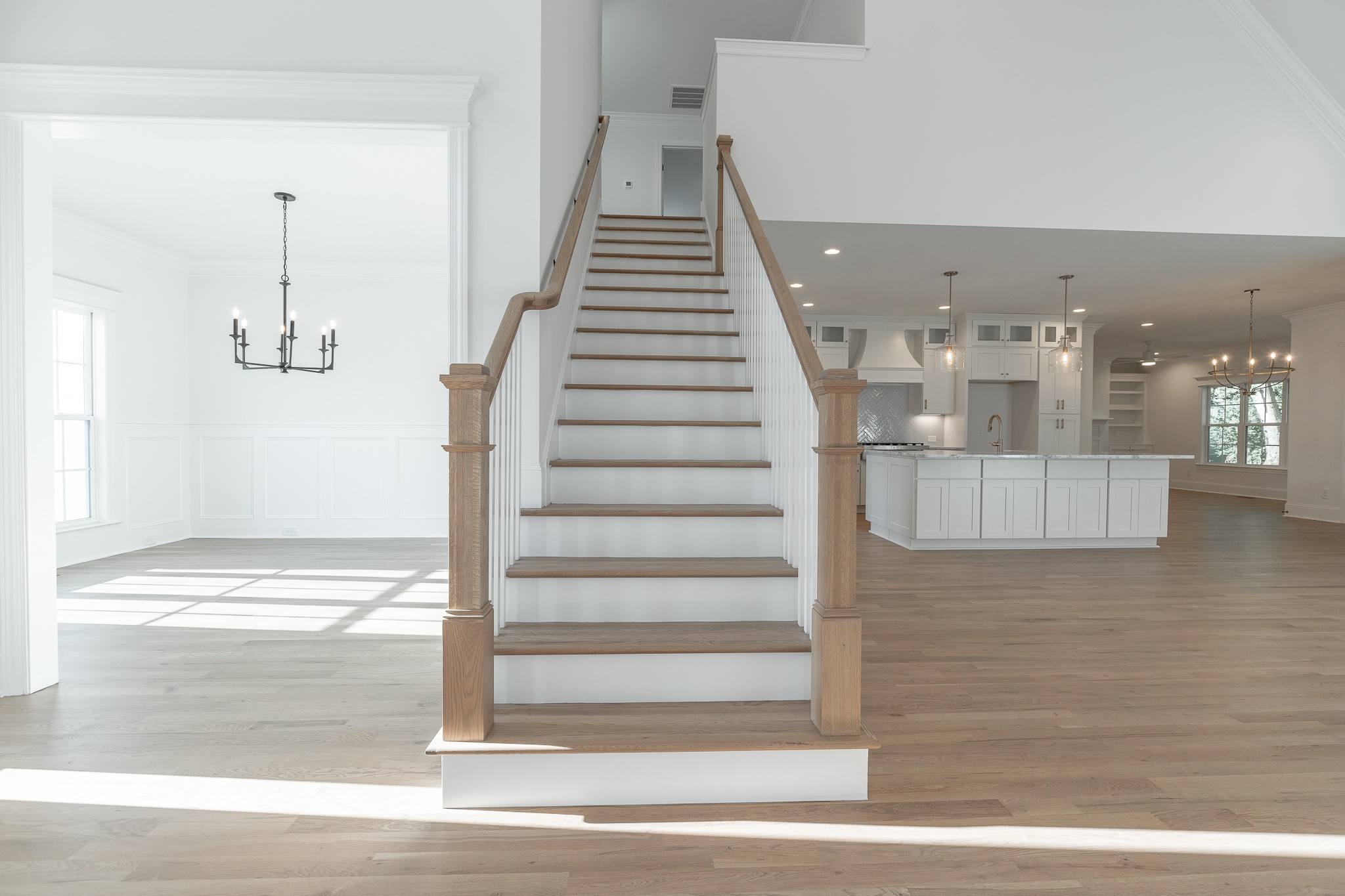 6048 Kidman Lane Spring Hill, TN 37174 - Photo 3 of 31 a view of staircase with white walls and windows