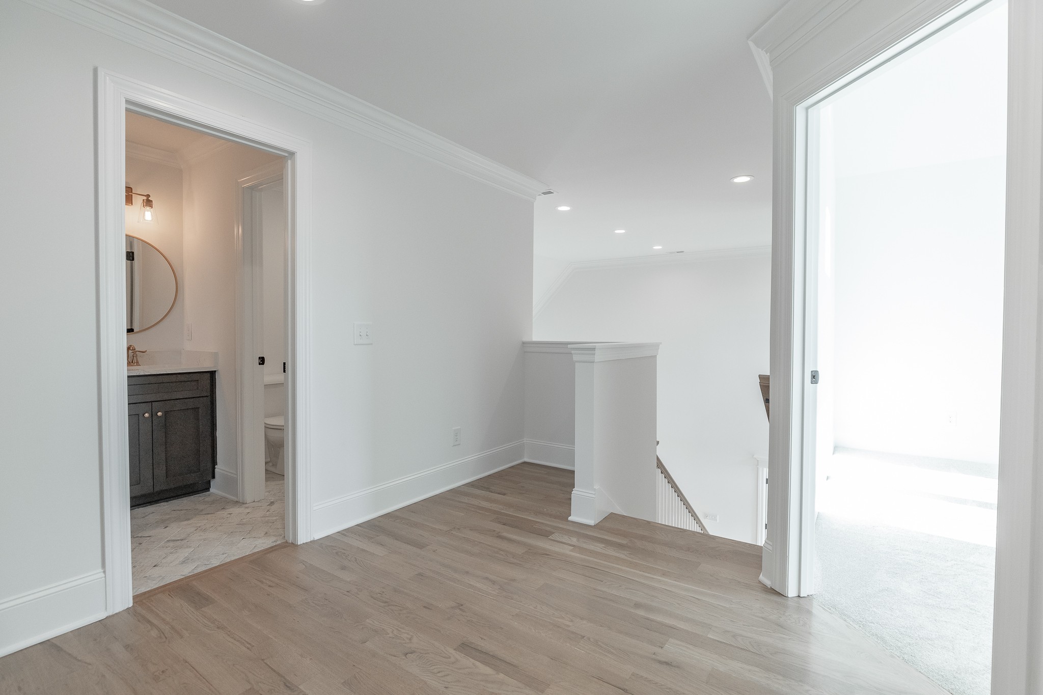6048 Kidman Lane Spring Hill, TN 37174 - Photo 22 of 31 a view of empty room with wooden floor and fan