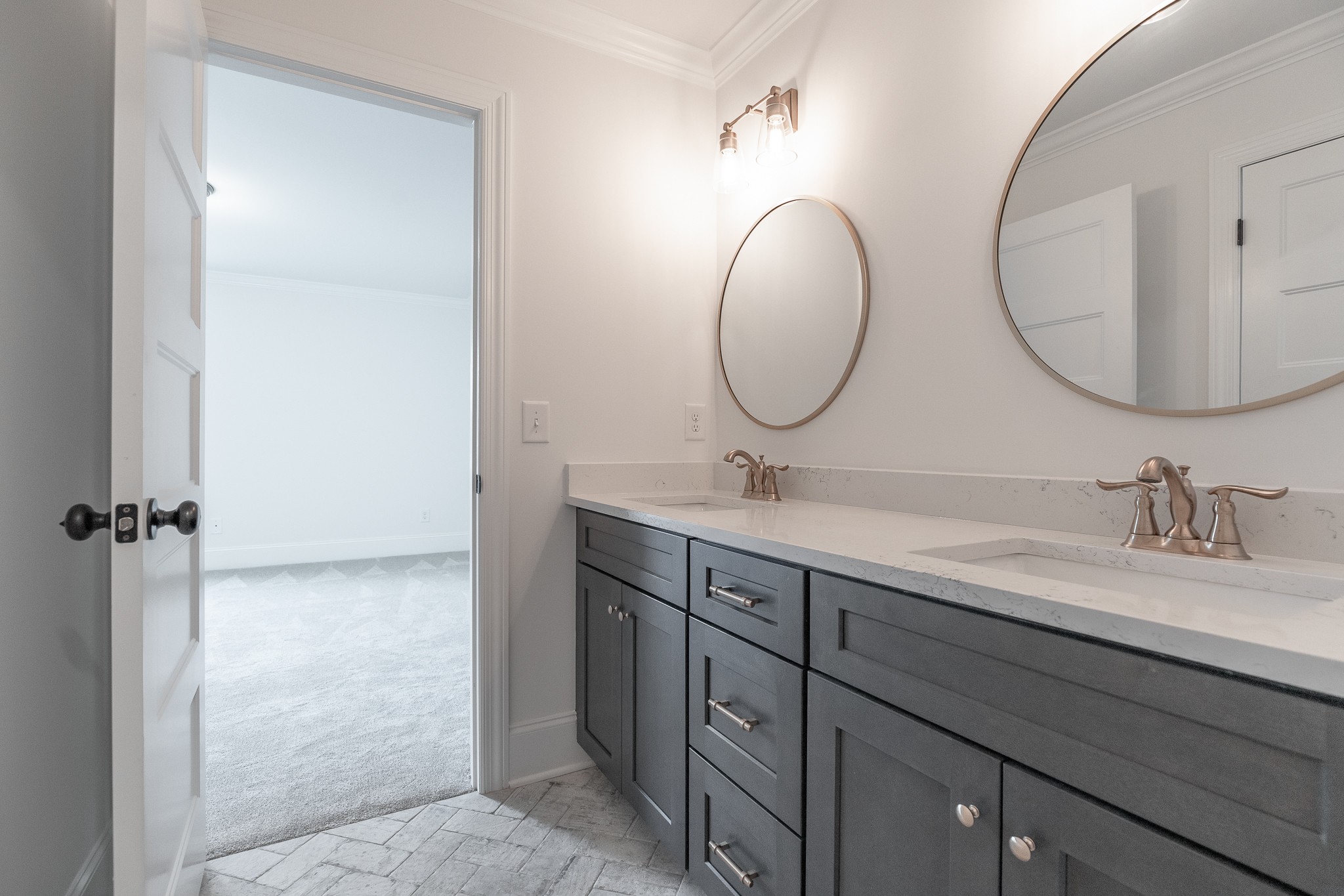 6048 Kidman Lane Spring Hill, TN 37174 - Photo 23 of 31 a bathroom with a double vanity sink and a mirror