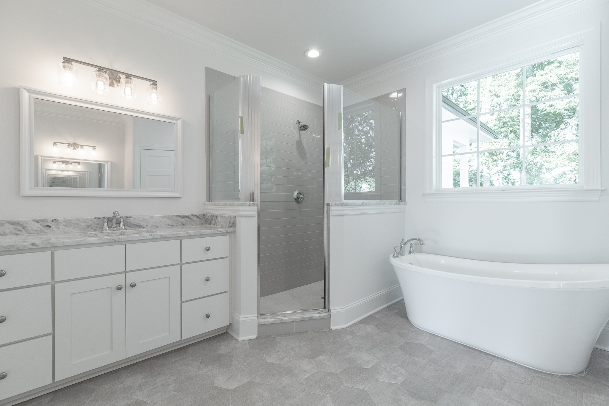 6048 Kidman Lane Spring Hill, TN 37174 - Photo 9 of 31 a bathroom with a granite countertop sink tub and shower