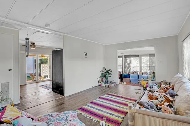 a living room with furniture and a couch
