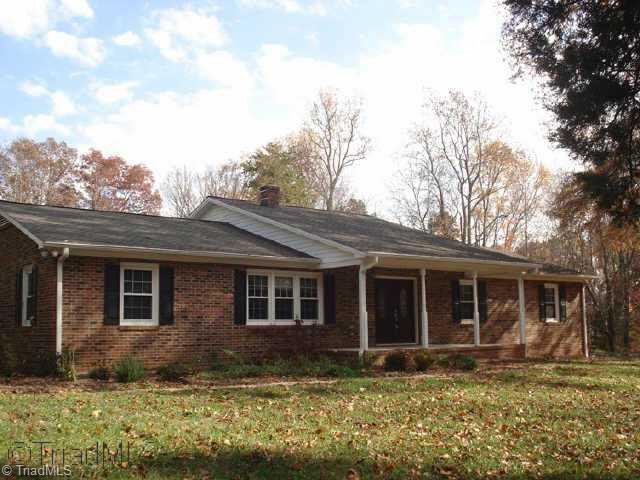 7883 Alcorn Road Oak Ridge, NC 27310 - Photo 1 of 9 Exterior Front.
