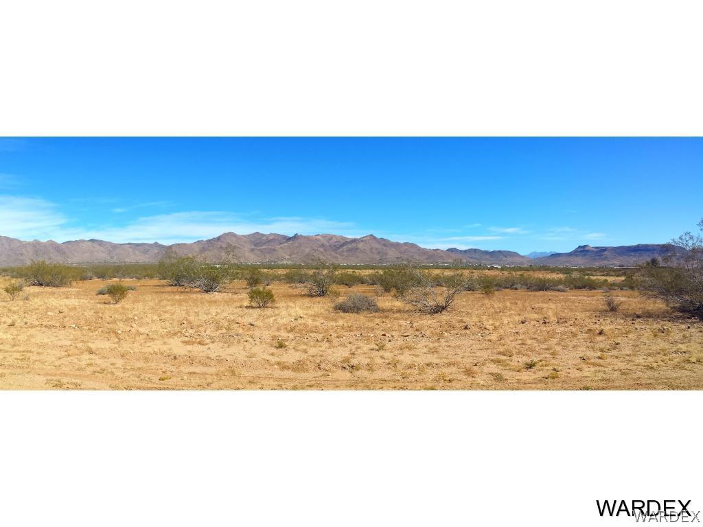 3865 Aztec Road Golden Valley, AZ 86413 - Photo 25 of 26 a picture of city lake and mountain view