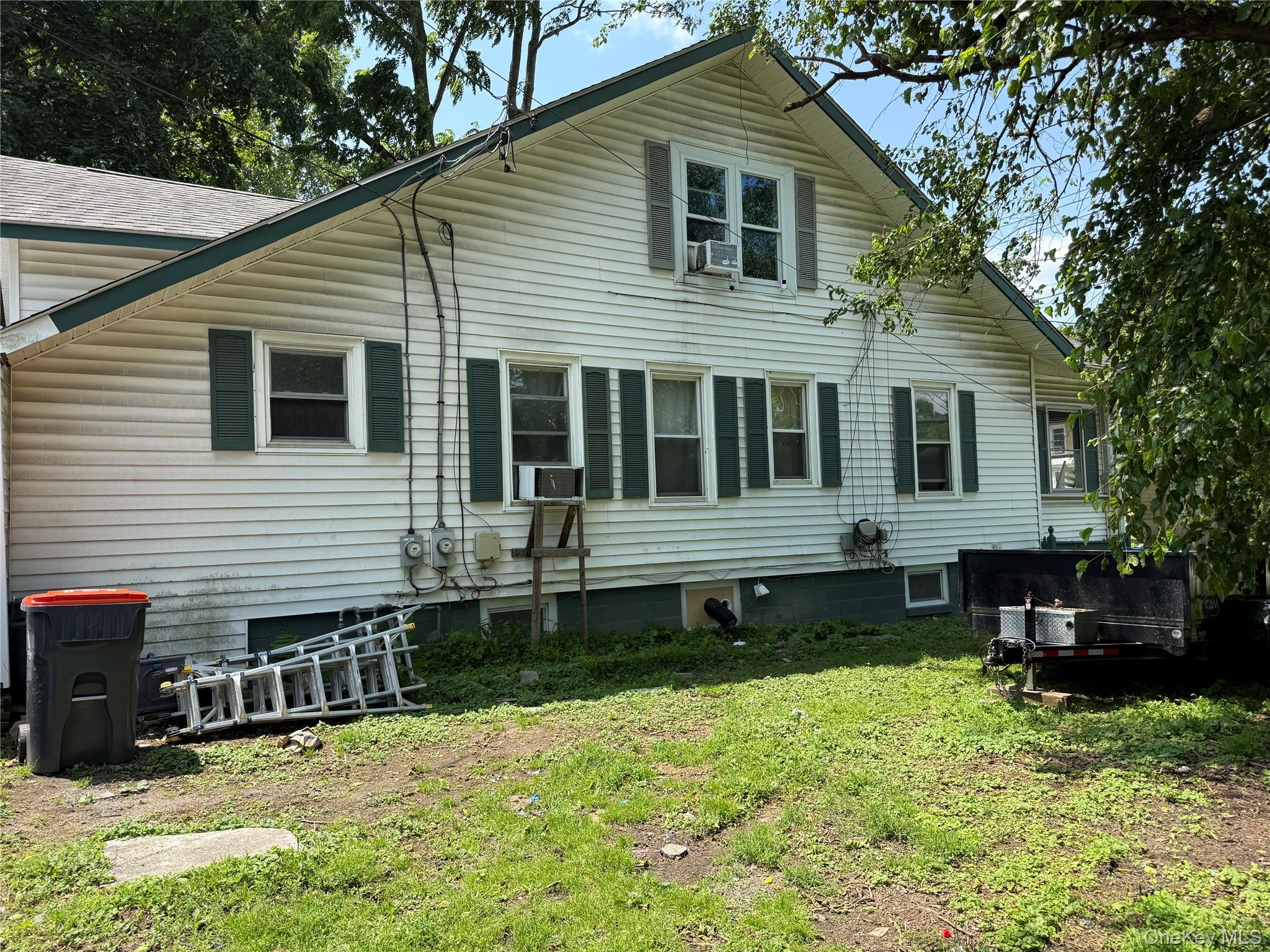 115 Innis Avenue Poughkeepsie, NY 12601 - Photo 2 of 28 Back of property featuring a yard
