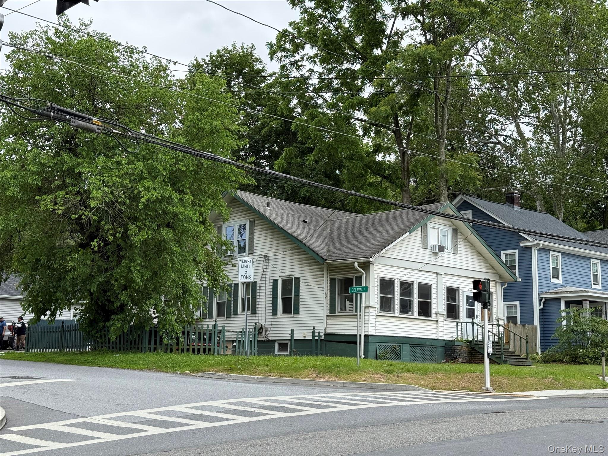 115 Innis Avenue Poughkeepsie, NY 12601 - Photo 5 of 28 View of front of house featuring a shingled roof