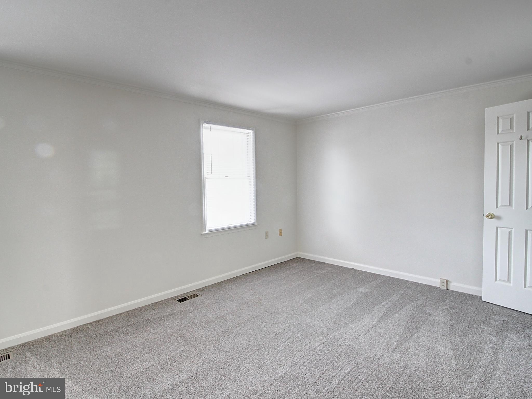 7990 Quay Court Frederick, MD 21701 - Photo 12 of 16 an empty room with a window