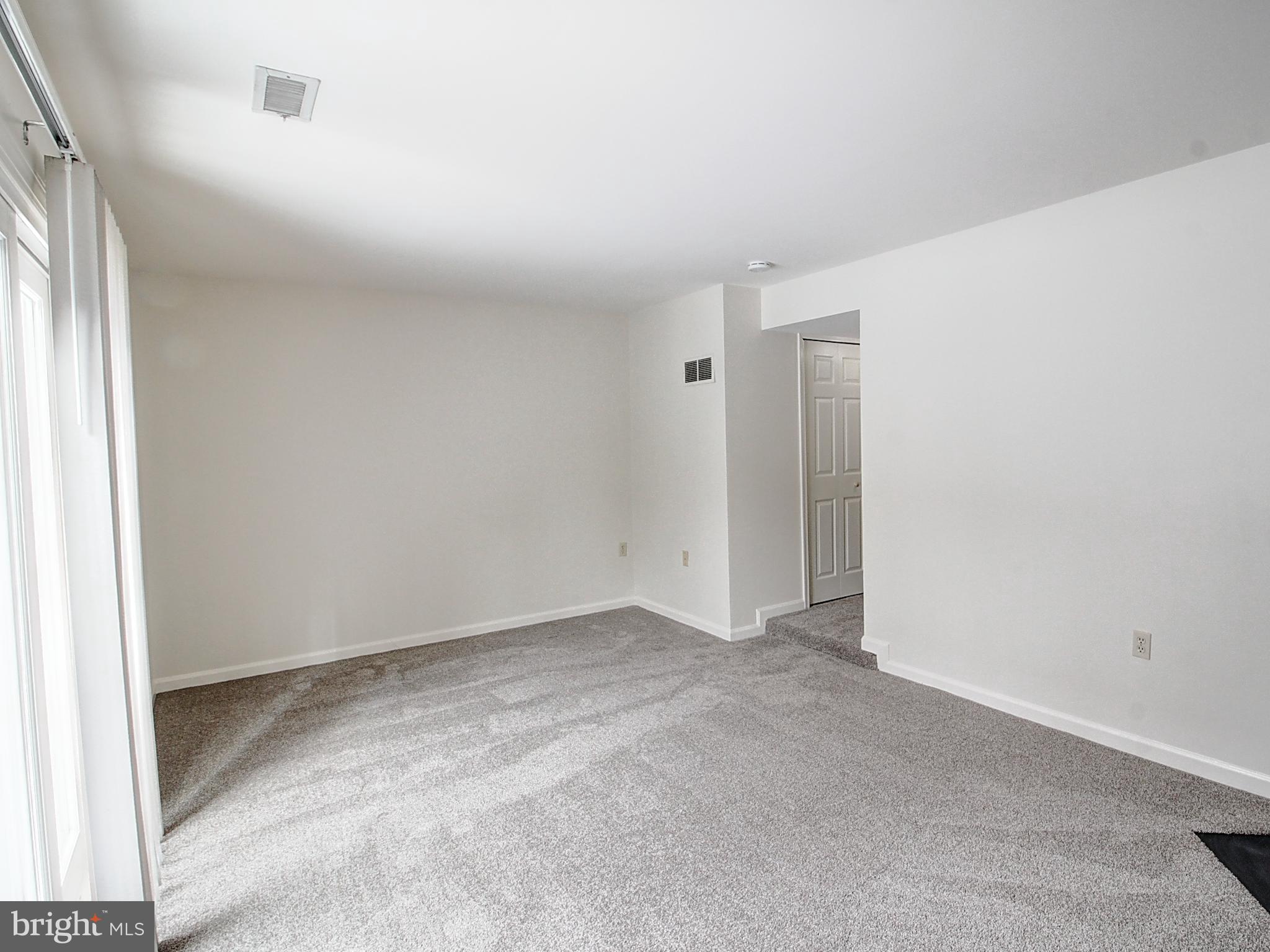 7990 Quay Court Frederick, MD 21701 - Photo 15 of 16 an empty room with a natural light