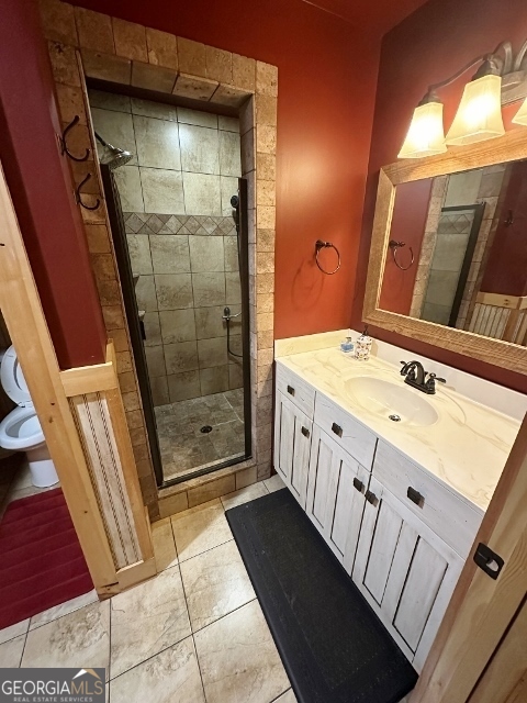 5559 Mill Creek Church Road Mitchell, GA 30820 - Photo 18 of 65 a bathroom with a double vanity sink and mirror
