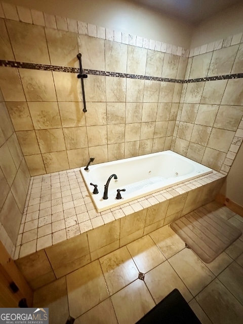 5559 Mill Creek Church Road Mitchell, GA 30820 - Photo 23 of 65 a bathroom with a bathtub