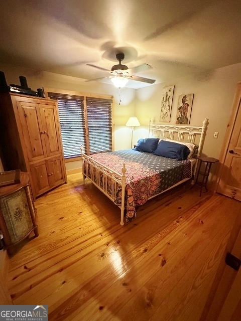 5559 Mill Creek Church Road Mitchell, GA 30820 - Photo 24 of 65 a bedroom with double bed and a window