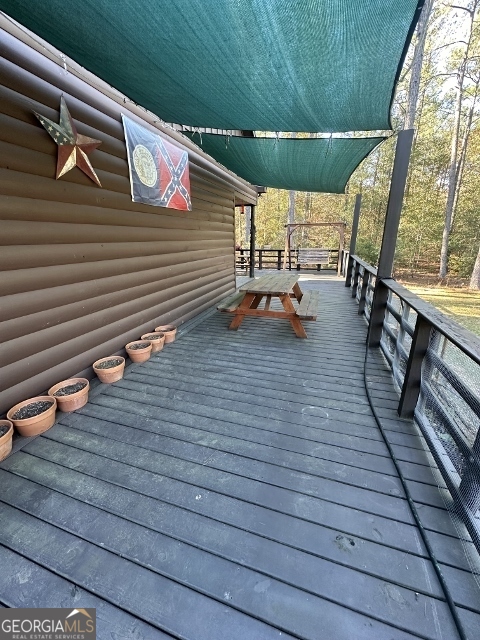 5559 Mill Creek Church Road Mitchell, GA 30820 - Photo 28 of 65 a view of outdoor space with seating
