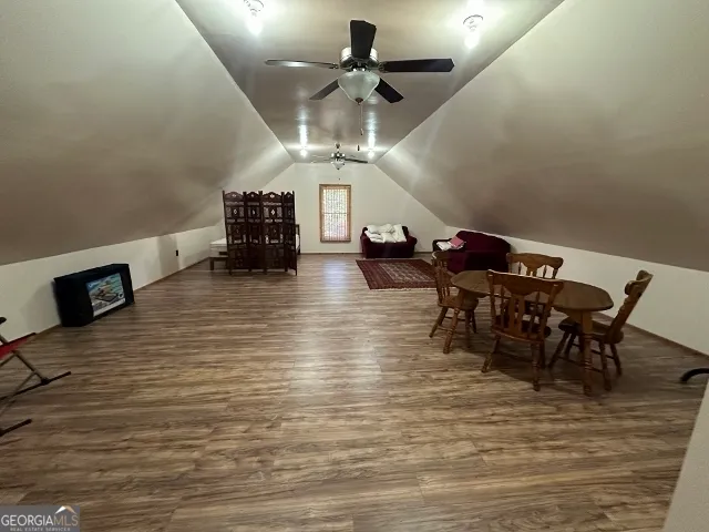 a view of a chairs and tables in the patio