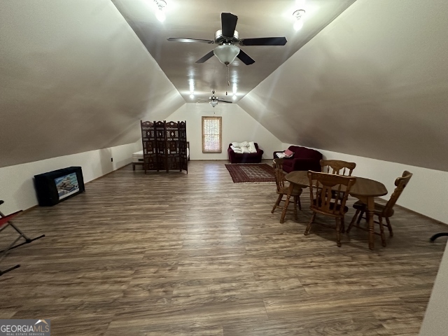 5559 Mill Creek Church Road Mitchell, GA 30820 - Photo 37 of 65 a view of a dining room with furniture and wooden floor