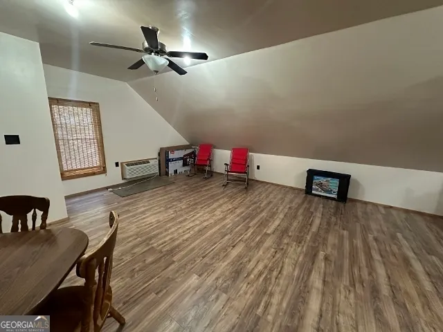 a view of a yard with a tree