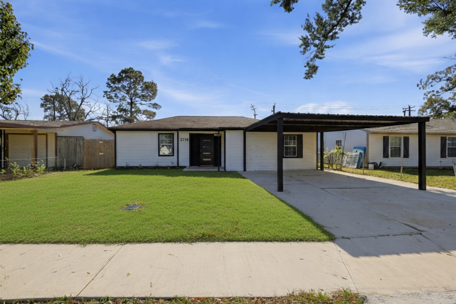 2716 Windsor Lane Pasadena, TX 77506 - Photo 1 of 22 a front view of a house with a garden