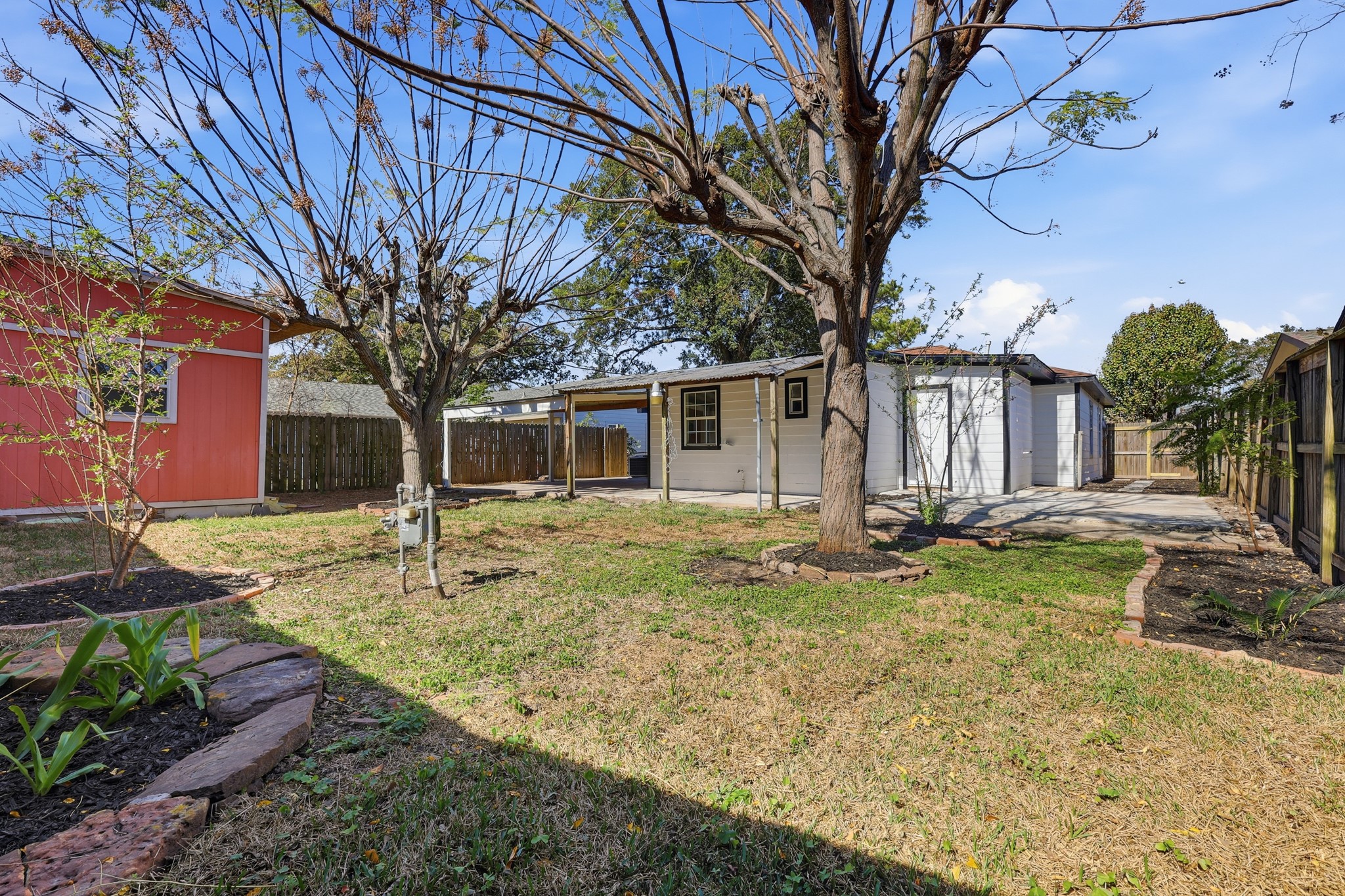 2716 Windsor Lane Pasadena, TX 77506 - Photo 22 of 22 a view of a yard with a house