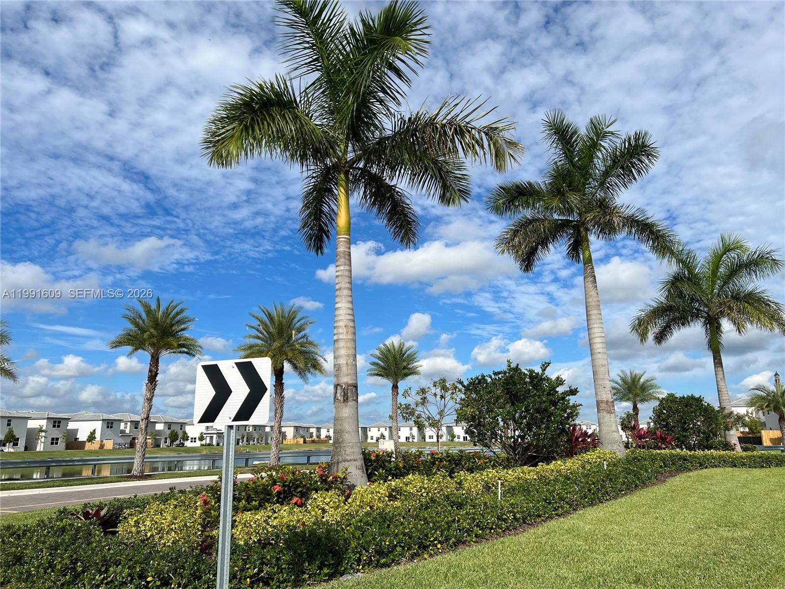 1864 Southeast 27th Street, Unit 1864 Homestead, FL 33035 - Photo 17 of 17 a view of outdoor space with palm trees