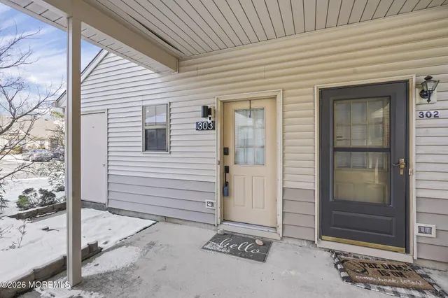 a living room with furniture and window