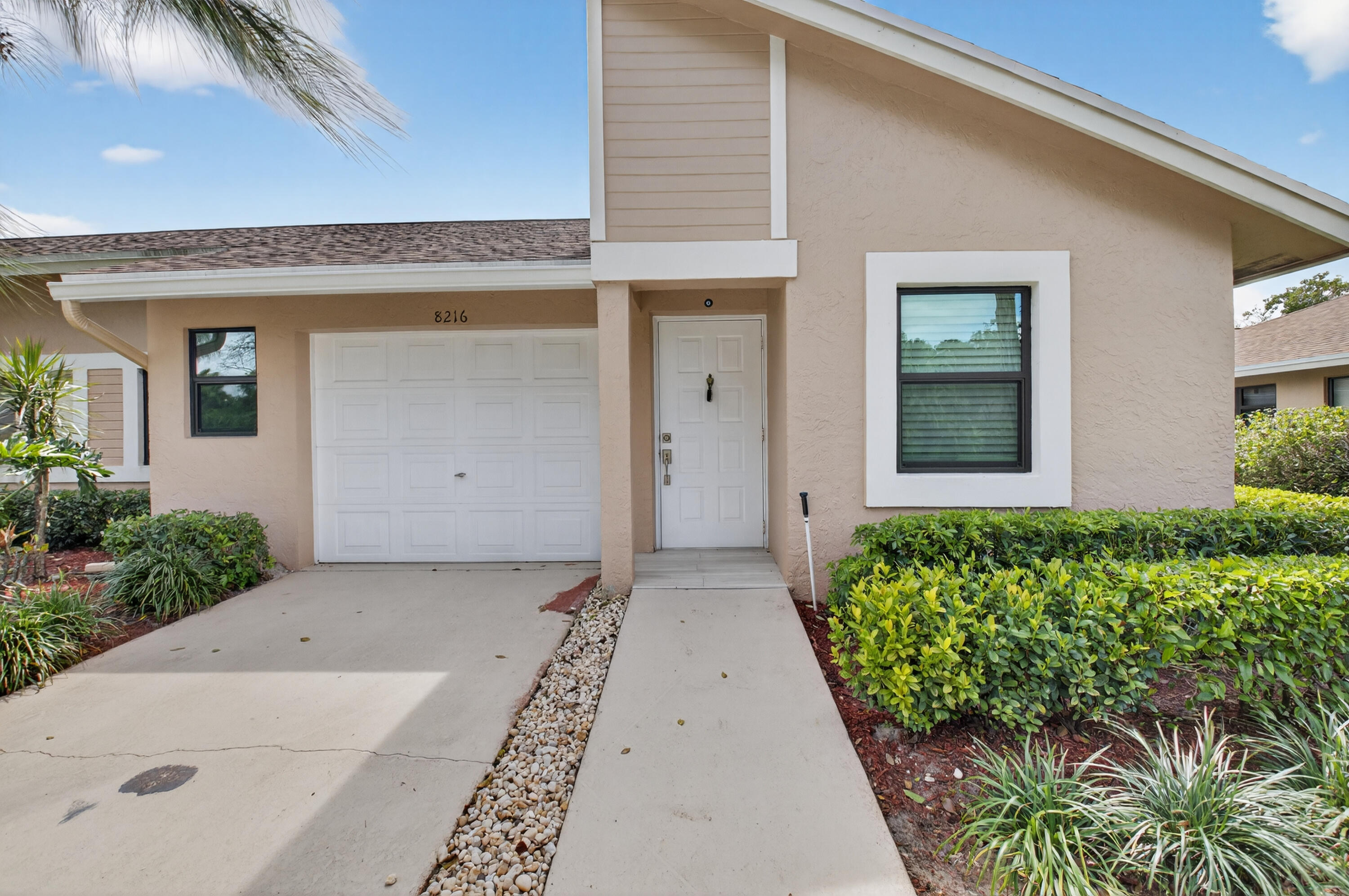 8216 Sweetbriar Way Boca Raton, FL 33496 - Photo 4 of 56 front view of a house