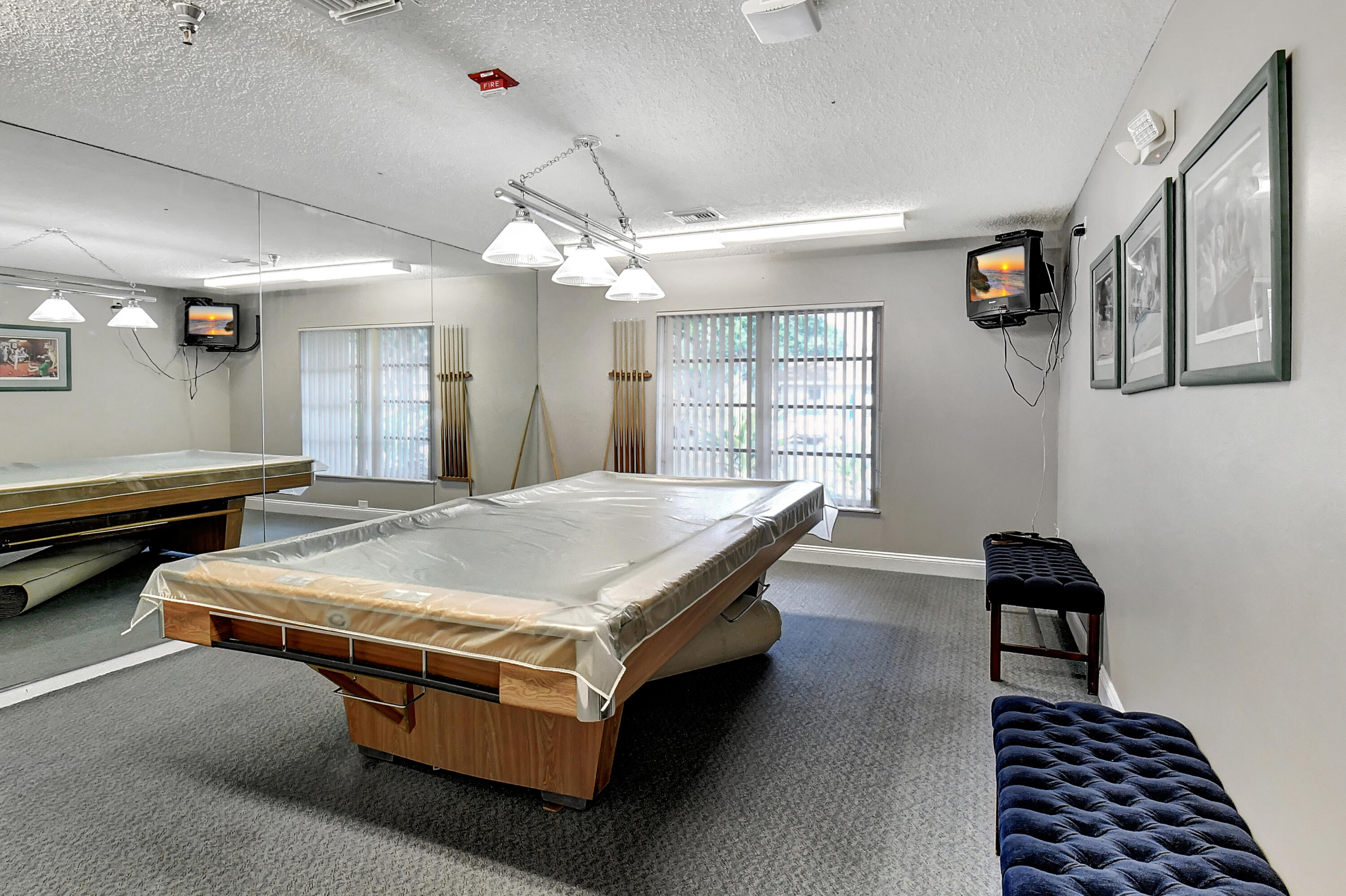 8216 Sweetbriar Way Boca Raton, FL 33496 - Photo 42 of 56 a spacious bedroom with a bed a dresser and potted plant on the dresser