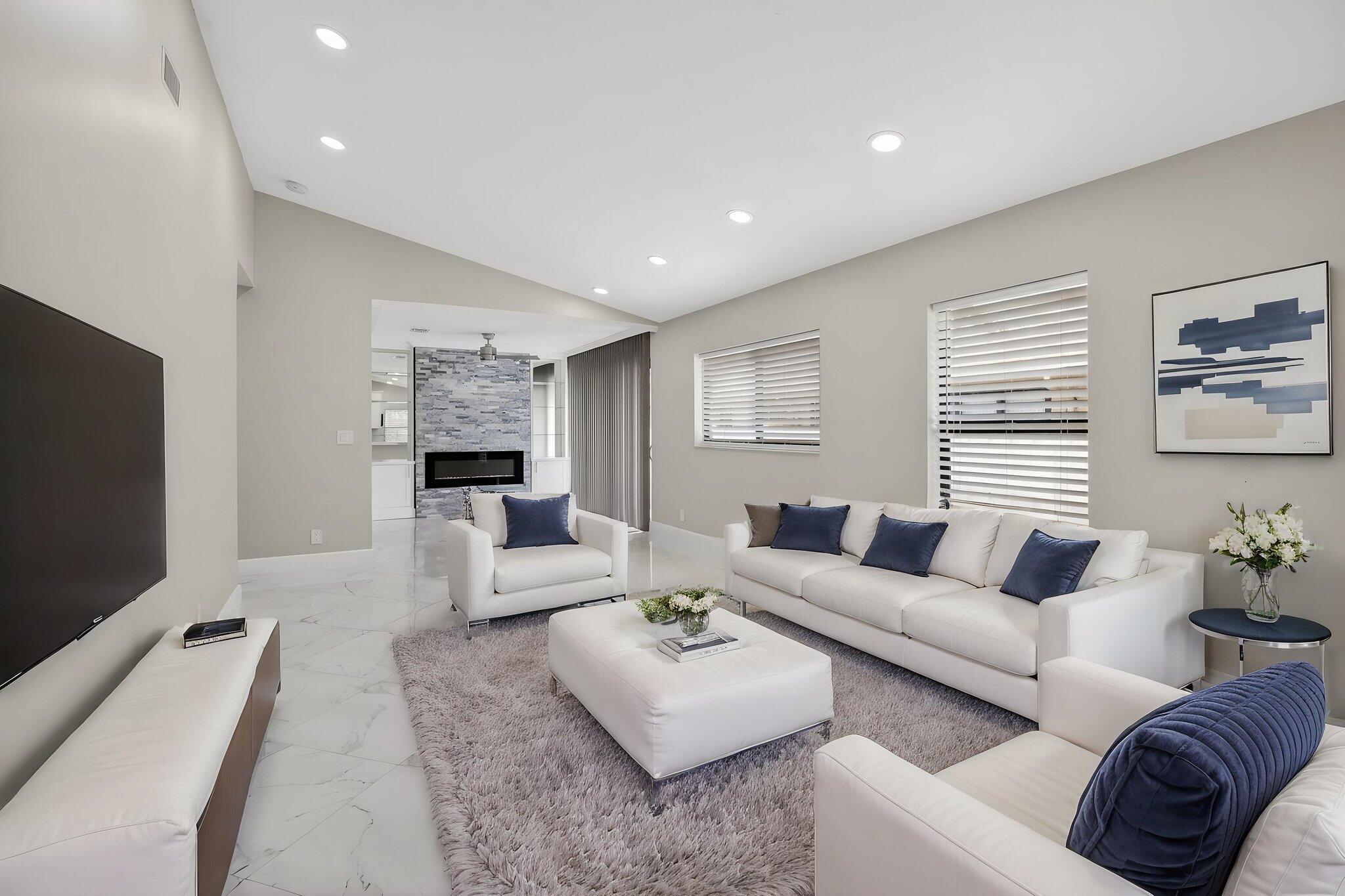 8216 Sweetbriar Way Boca Raton, FL 33496 - Photo 55 of 56 a living room with furniture and a flat screen tv