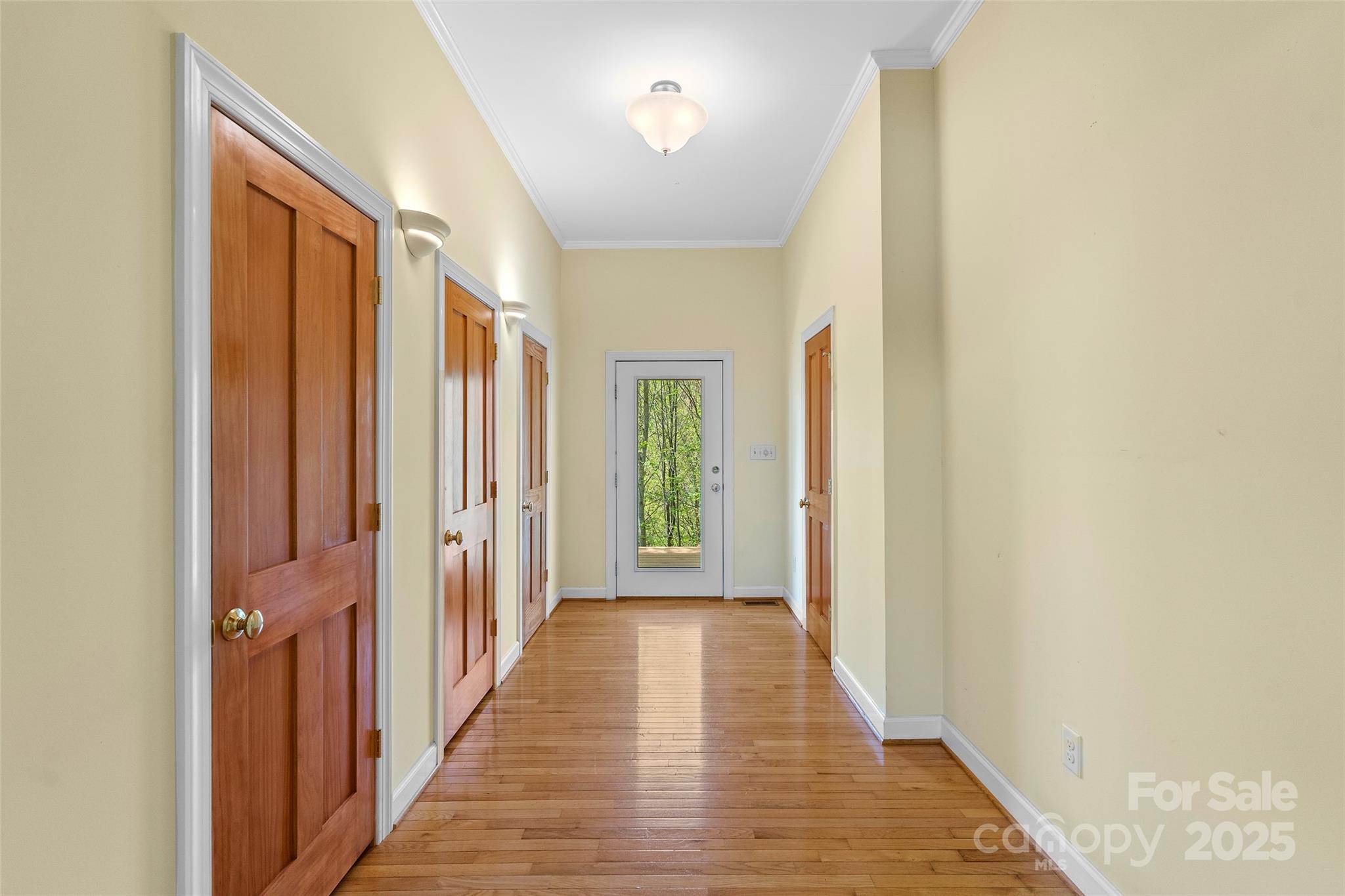 80 Ivy Cove Road Fairview, NC 28730 - Photo 13 of 48 a view of a hallway with wooden floor and staircase