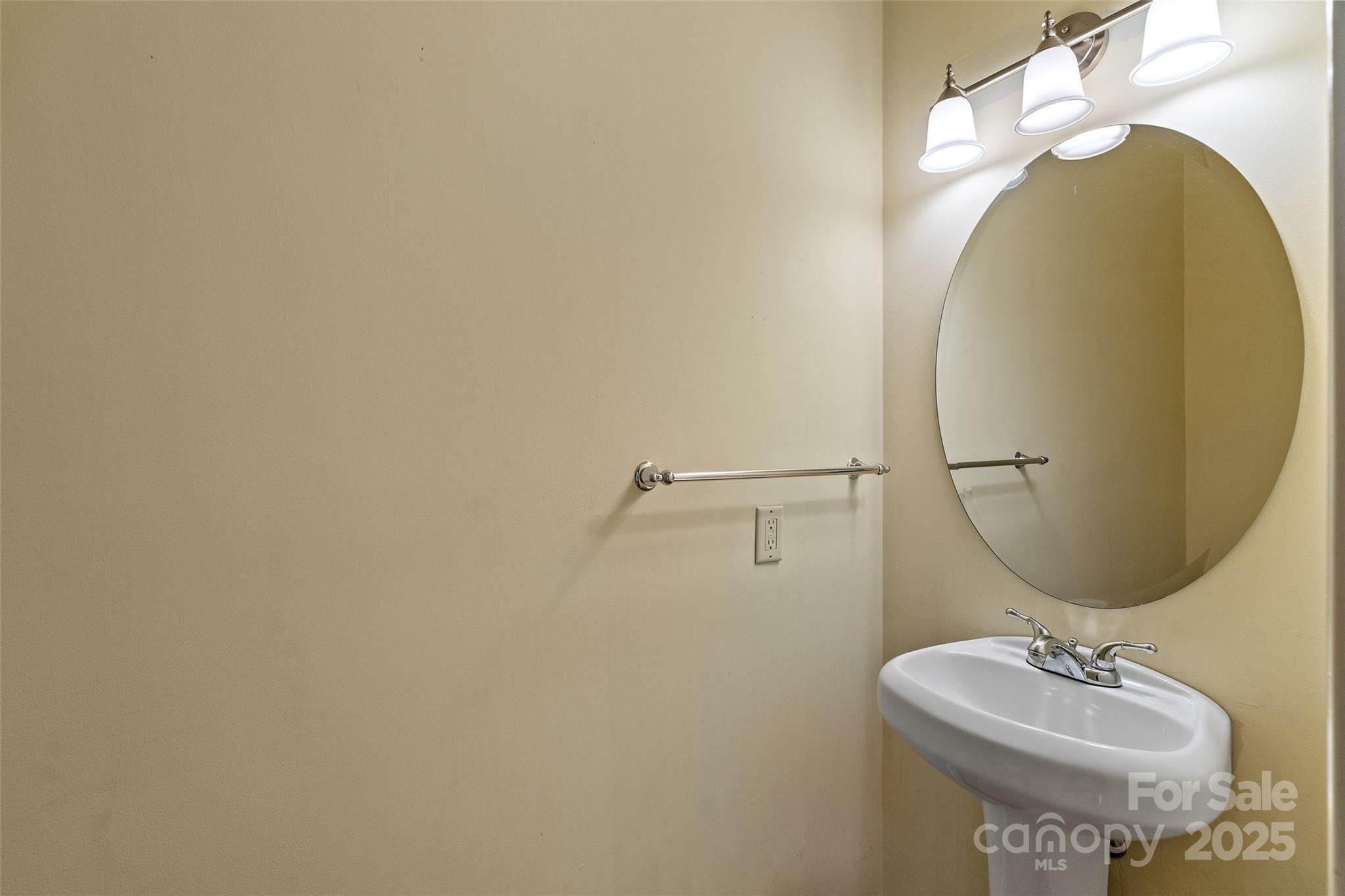 80 Ivy Cove Road Fairview, NC 28730 - Photo 15 of 48 a bathroom with a sink and a mirror