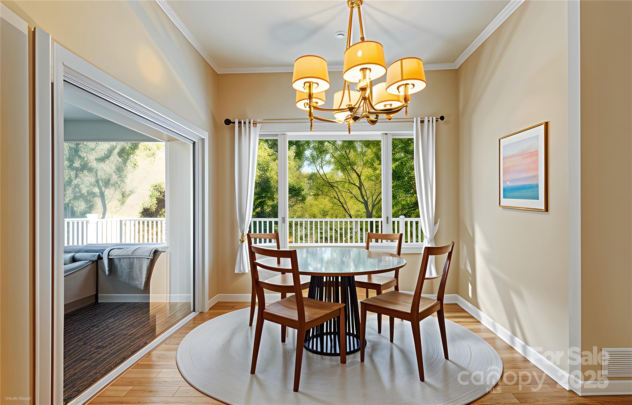 80 Ivy Cove Road Fairview, NC 28730 - Photo 25 of 48 a view of a dining room with furniture a chandelier and wooden floor