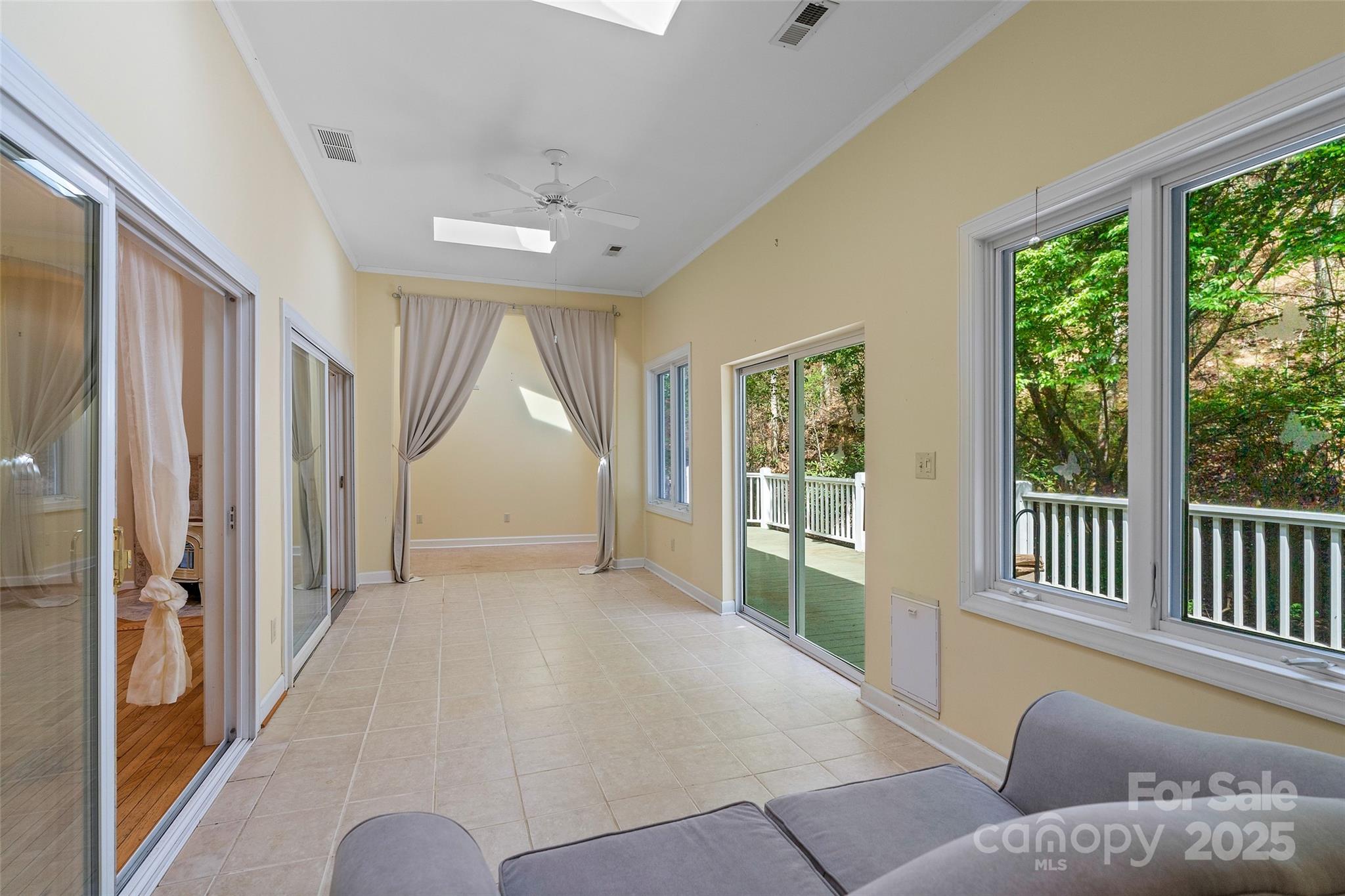 80 Ivy Cove Road Fairview, NC 28730 - Photo 36 of 48 a living room with furniture and a large window