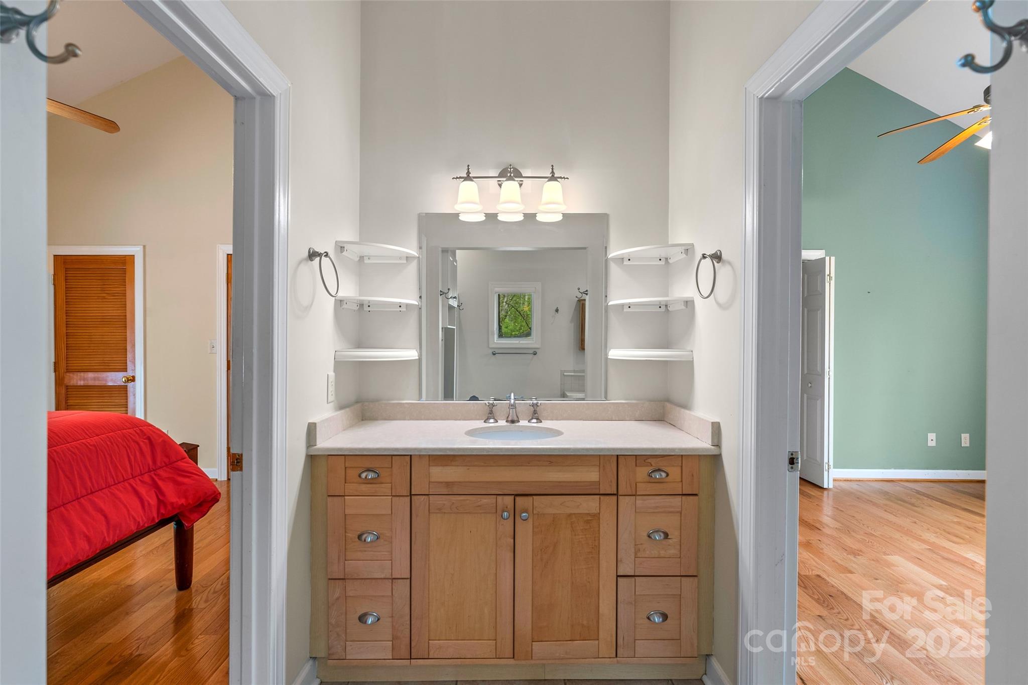80 Ivy Cove Road Fairview, NC 28730 - Photo 42 of 48 a en suite bathroom with a granite countertop sink and a mirror
