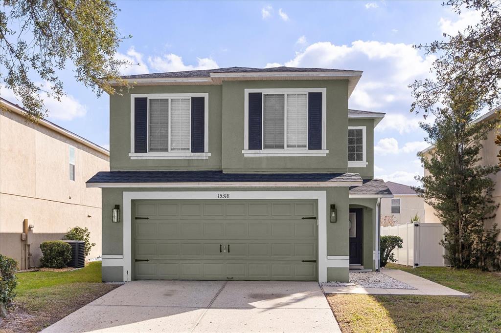 15318 Beamleigh Road Winter Garden, FL 34787 - Photo 1 of 1 a front view of a house with a yard