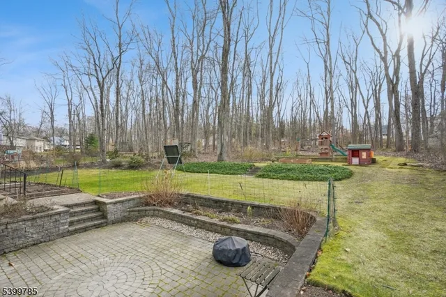 a childrens park with lots of swings and slides