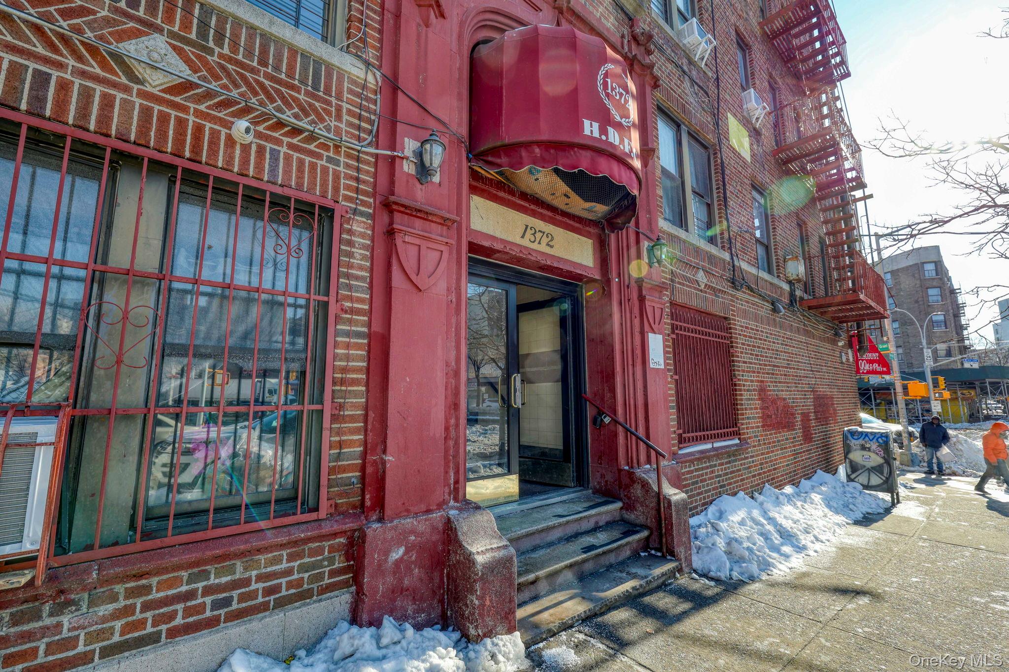 1372 Shakespeare Avenue, Unit 2H Bronx, NY 10452 - Photo 14 of 14 a view of a building with a large windows