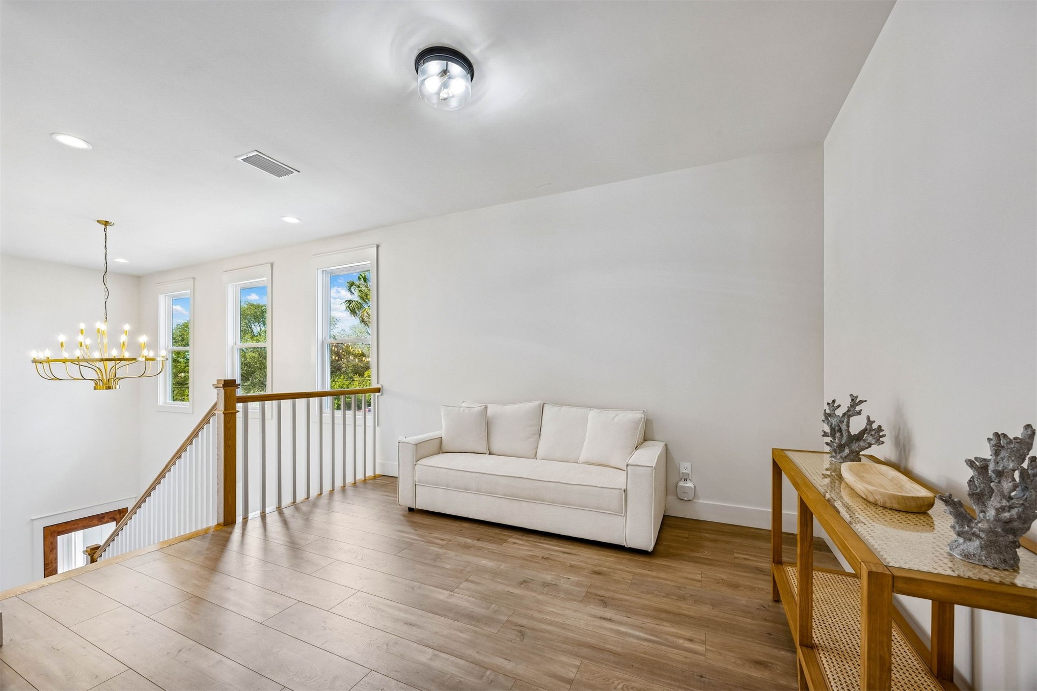 424 South 3rd Street Fernandina Beach, FL 32034 - Photo 16 of 38 a living room with furniture and wooden floor