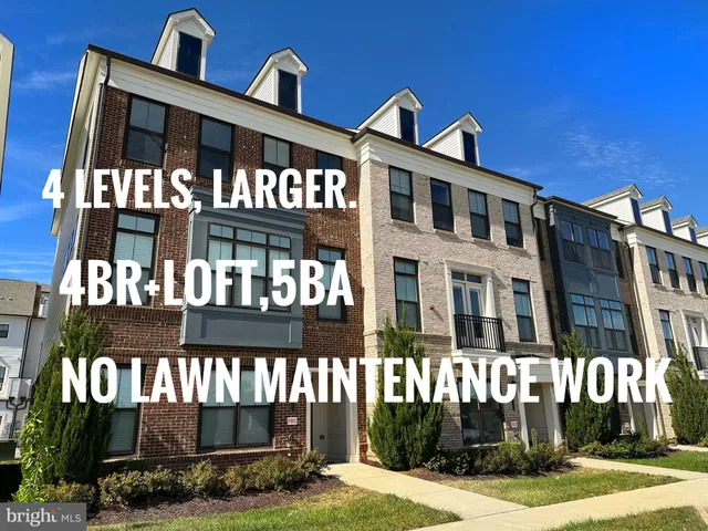 a front view of building with yard