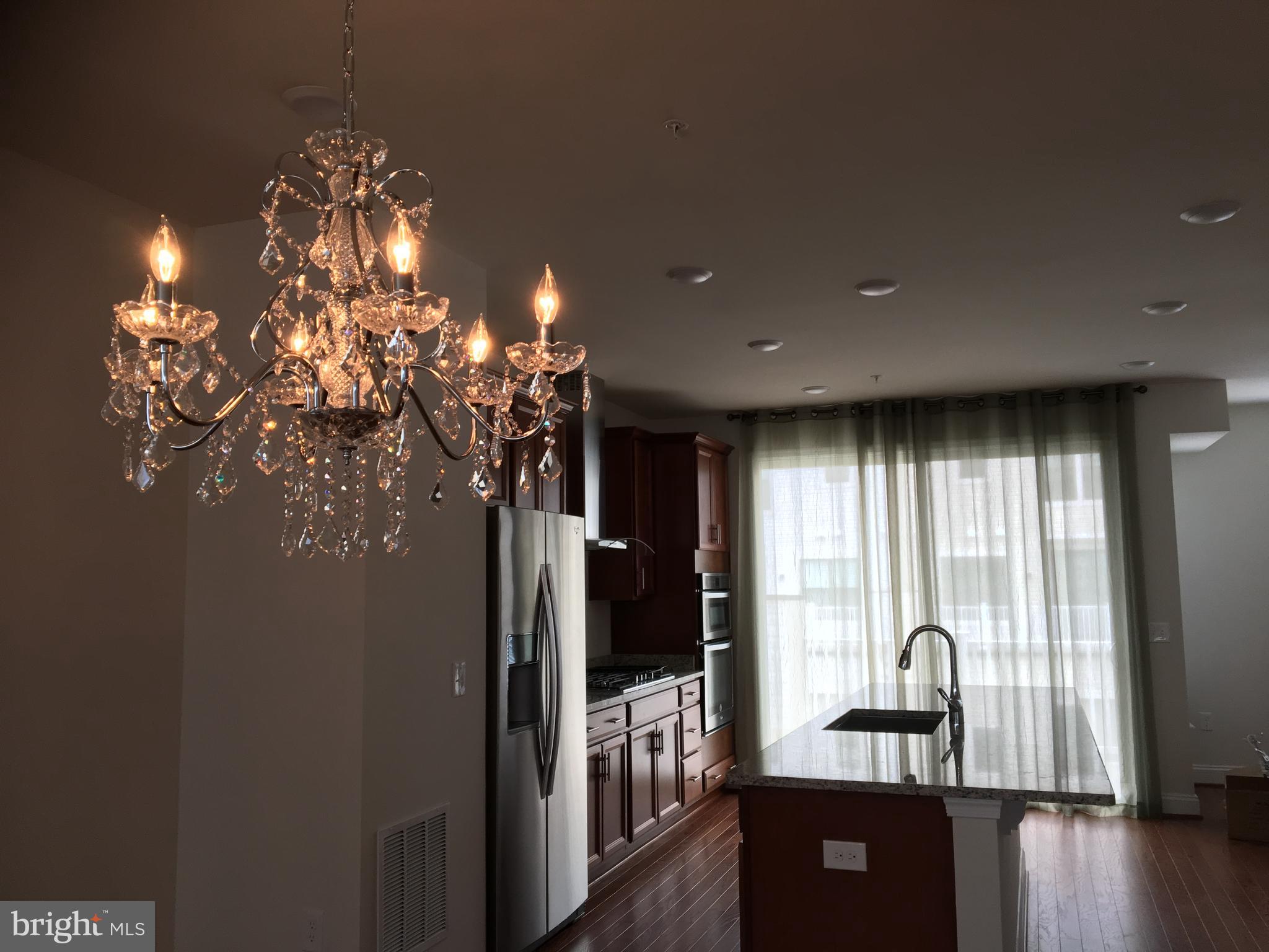 22591 Amendola Terrace Ashburn, VA 20148 - Photo 11 of 39 a view of a livingroom with furniture window and outside view