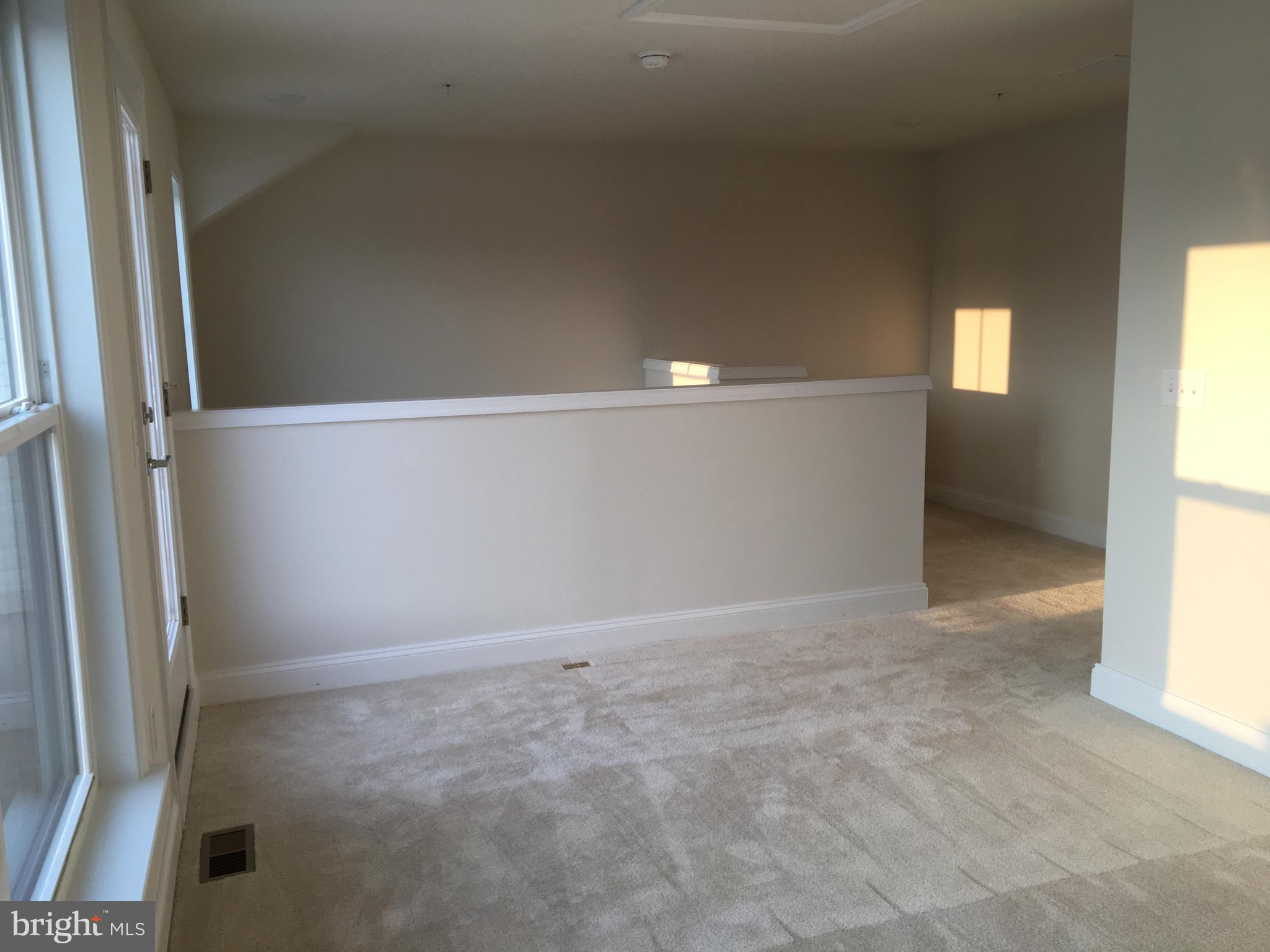 22591 Amendola Terrace Ashburn, VA 20148 - Photo 28 of 39 an empty room with windows