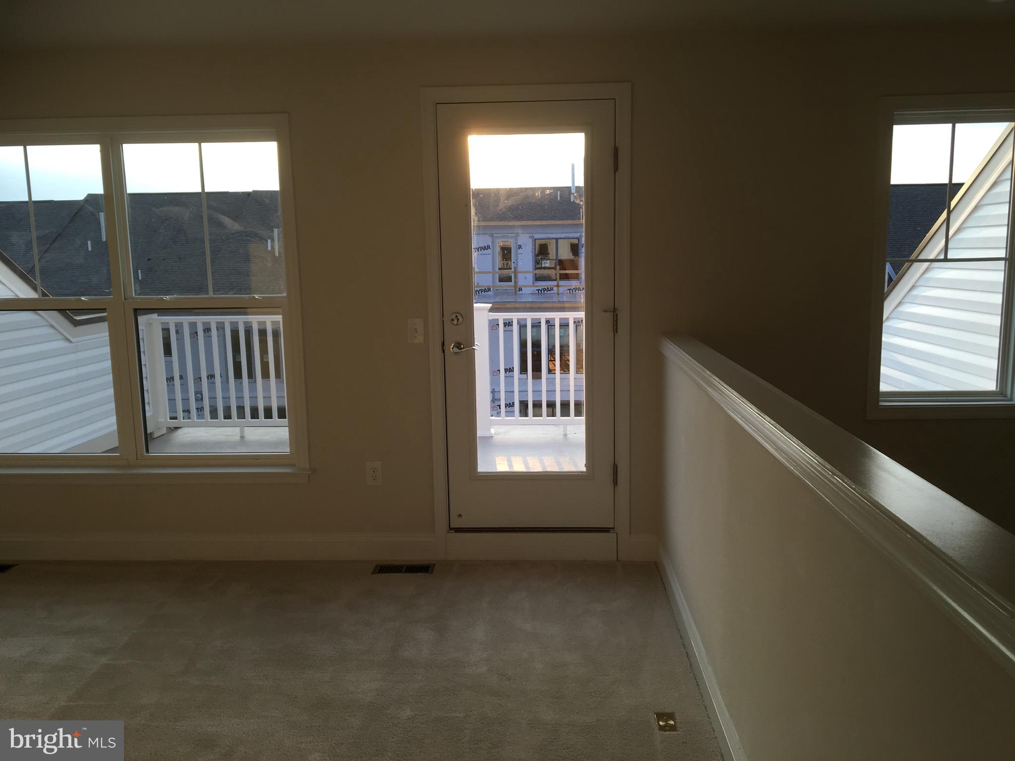 22591 Amendola Terrace Ashburn, VA 20148 - Photo 29 of 39 a view of an empty room and window