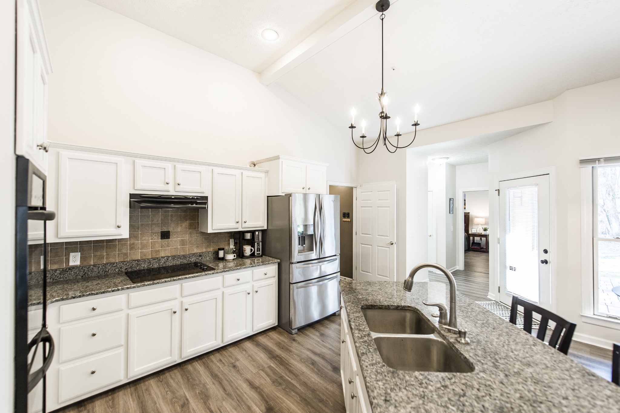 4305 Franklin Road Lebanon, TN 37090 - Photo 15 of 67 a kitchen with stainless steel appliances granite countertop a sink refrigerator and cabinets