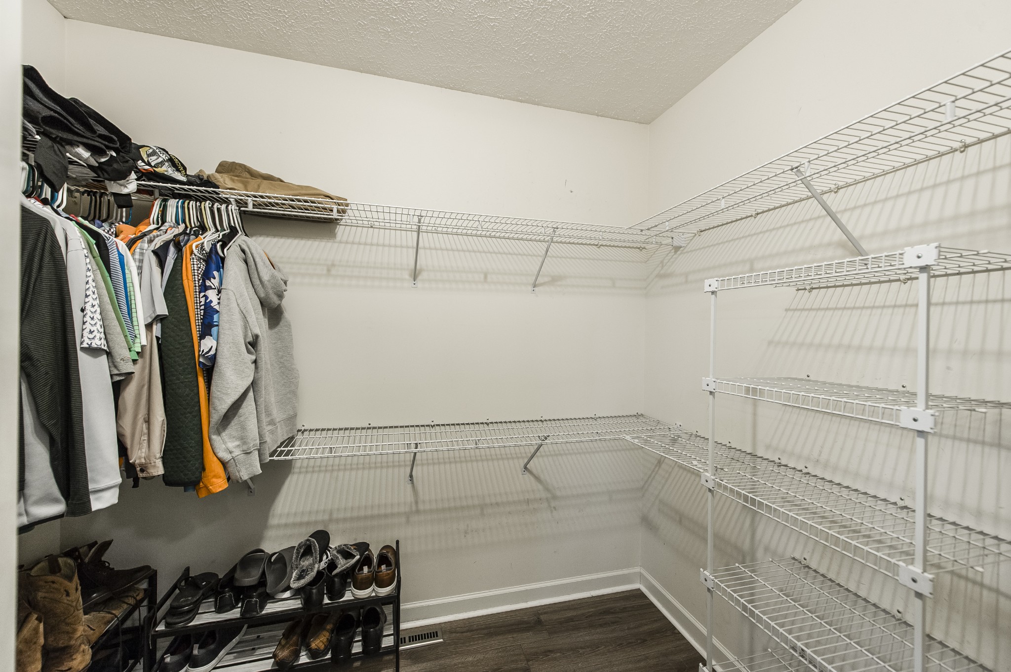 4305 Franklin Road Lebanon, TN 37090 - Photo 31 of 67 a view of walk in closet with clothes and shoes