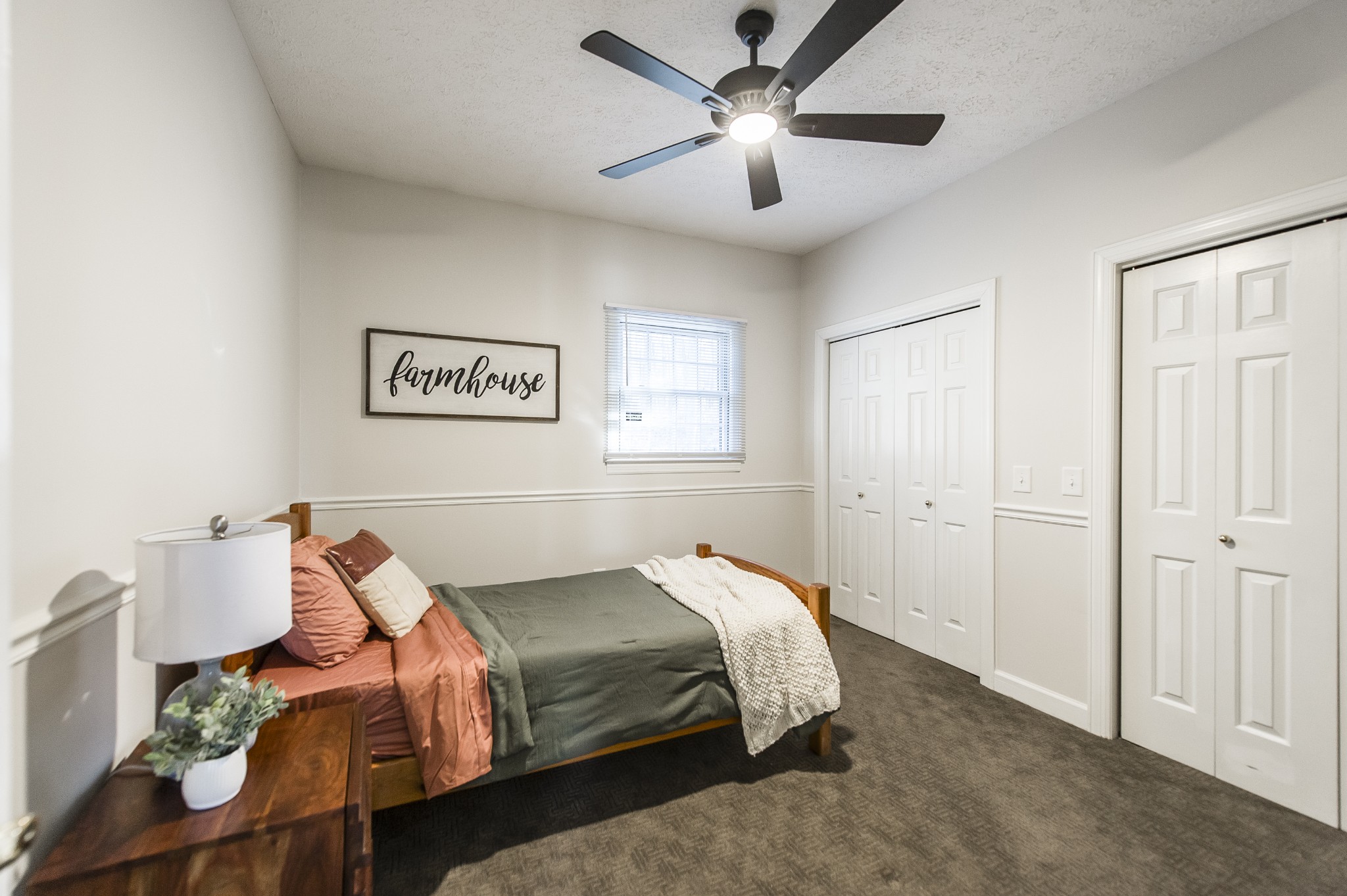 4305 Franklin Road Lebanon, TN 37090 - Photo 33 of 67 a bedroom with a bed and a chandelier