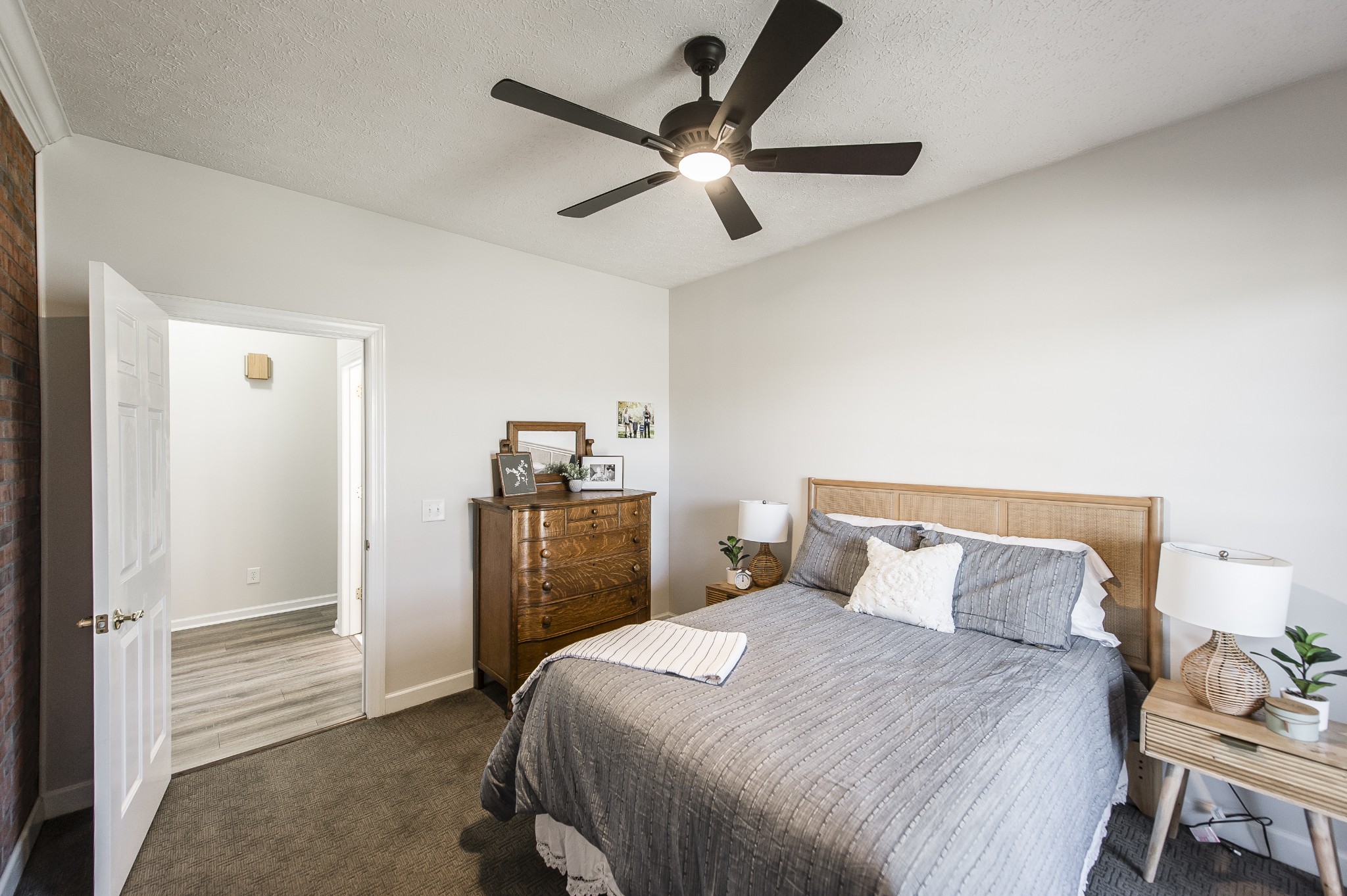 4305 Franklin Road Lebanon, TN 37090 - Photo 37 of 67 a bedroom with a bed and a chandelier